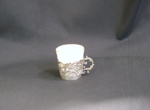 Small cup with silver base