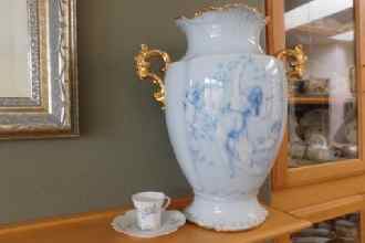 Large vase and small cup and saucer